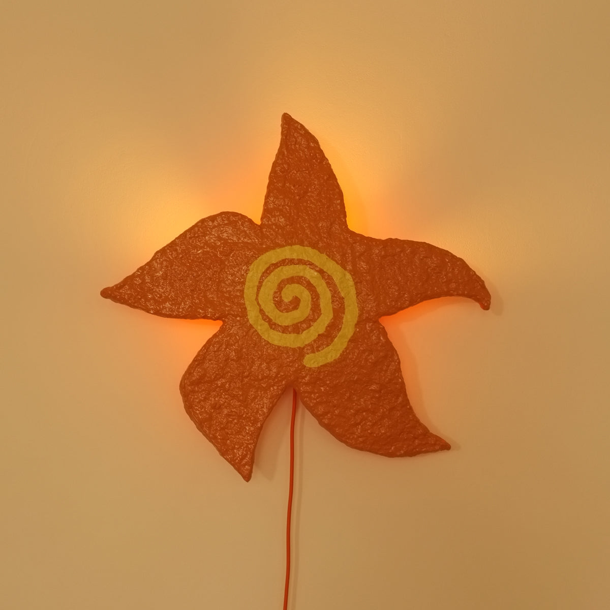 SUN SWIRL SCONCE