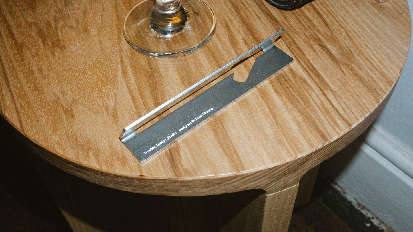 V - BOTTLE OPENER